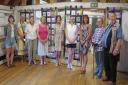 The unveiling of the Quilt Banners in Great Dunmow. Participants with textiles artist Ellen Jackson 5th from left and Pat and Steve Schorah (right)