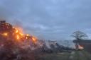 Destroyed - large fire affecting a pile of hay in Maldon