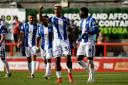 Off the mark - Lyle Taylor celebrates after scoring for Colchester United at Morecambe