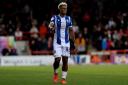 Sorry - Lyle Taylor has apologised to Colchester United's fans after the U's allowed a two-goal lead to slip to draw 3-3 at ten-man Morecambe