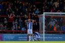 Despair - Colchester United's Harry Anderson cannot hide his disappointment after they concede an equaliser at Morecambe