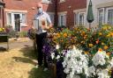 Peter Birsan, maintenance manager at Mountfitchet House, with his Stansted in Bloom awards