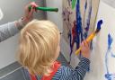 A child playing on Buffy Playbus in Uttlesford