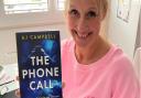 Author AJ Campbell with her new book called The Phone Call