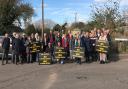 Residents with signs reading 