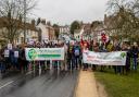 Stop Wethersfield Airfield Prisons (SWAP) campaign supporters in Great Bardfield with their banners