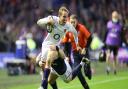 England's Max Malins is tackled during the Six Nations match against Scotland.