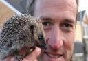 Ben Fogle with a hedgehog