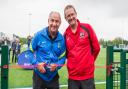 Ossie Ardiles cuts the ribbon on the new 3G pitch, alongside Matt Clare