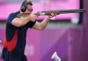 Great Britain's Matthew Coward-Holley in action during the men's trap final at Asaka Shooting Range