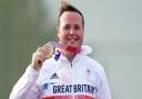 Great Britain's Matthew Coward-Holley poses with his bronze medal after finishing third in the Trap Men's final at Asaka Shooting Range