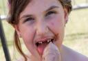 Six-year-old Sophie enjoys an ice cream