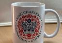 The front of the coronation mug donated by Mulberry Homes