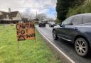 The makeshift pothole warning sign