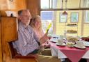 Dunmow Probus Club members enjoying an afternoon tea on the train