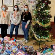 Home-Start Essex with Saffron Walden constituency MP Kemi Badenoch and the toys donated for the Christmas appeal