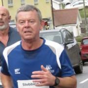 Rob Burgess in action for Grange Farm & Dunmow Runners at the Stebbing 10-mile.