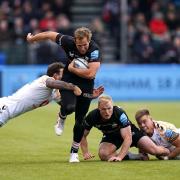 Max Malins makes a break during Saracens' win over Wasps in the Premiership.