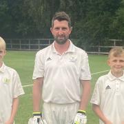 The Millbank family with 13-year-old Alex (left) and 11-year-old Zack (right) either side of dad Graham.