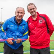 Ossie Ardiles cuts the ribbon on the new 3G pitch, alongside Matt Clare