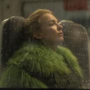 Villanelle (Jodie Corner) on board a Greater Anglia train from Killing Eve.