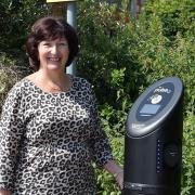 Councillor Wendy Schmitt of Braintree District Council with one of the new electric vehicle chargers at Newlands Drive car park, Witham