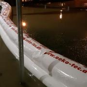 Holding back water after the river burst in banks in Great Notley