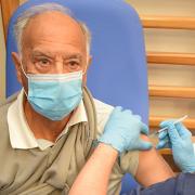 Alan McClaughlin from Rayne receives the Covid-19 immunisation at Broomfield Hospital