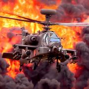 Agusta Westland Apache AHMk1 Helicopter in mock attack at the Duxford Air Festival 2019. Picture: Gerry Weatherhead