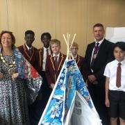 Felsted pupils with Mayor of Chelmsford Linda Mascot and Ian Mascot, and their insulating tent made of recycled crisp packets