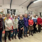 Dunmow Community Singers rehearsing with St Peter's Church choir