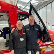 Terry Nunn (left) with the air ambulance pilot