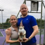 Hollie Jamieson and brother Greig Dowding with the Stebbing Tennis Club's gnome trophy. Picture: STEBBING TENNIS