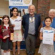 Nicole, Ankhan and Matilda are pictured with Gloria Nichols and Jenny Versey, along with Barry Clark, president of the Rotary Club of Dunmow