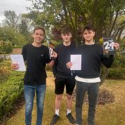 HRS students Ben, Oliver and Harry with their GCSE results