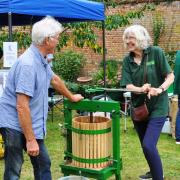 Apple juicing at the Gardens of Easton Lodge