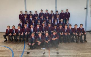 The champion football squads of Helena Romanes School with their trophies. Picture: HRS