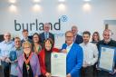 Burland Technology Solutions receiving its fourth King's Award. from Lady Clare of Euston, Lord Lieutenant of Suffolk.