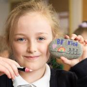 One of the pupils encouraging people to “be kind” following World Kindness Day