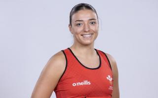 Ex-Felsted School pupil Poppy Tydeman in her Wales kit. Picture: WALES NETBALL